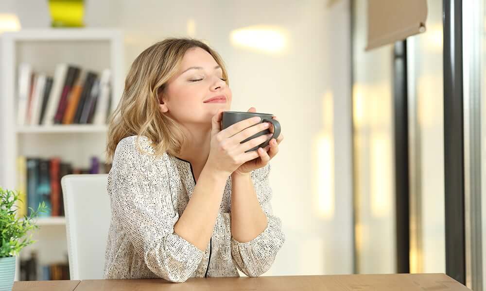 lady holding a cup of tea