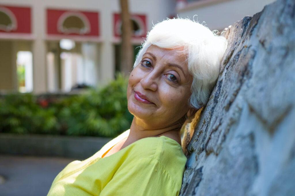 woman-older-green-outfit