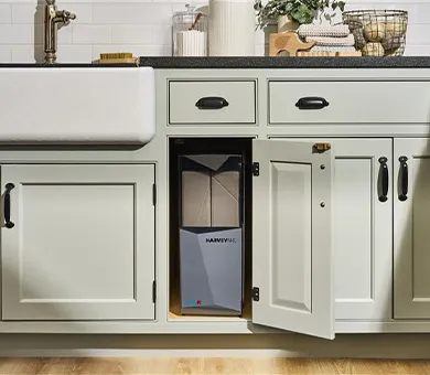 water softener in cupboard